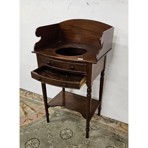 266 - Regency Mahogany Washstand, an oval shaped gallery over bowl well, above a single drawer, a faux dra... 