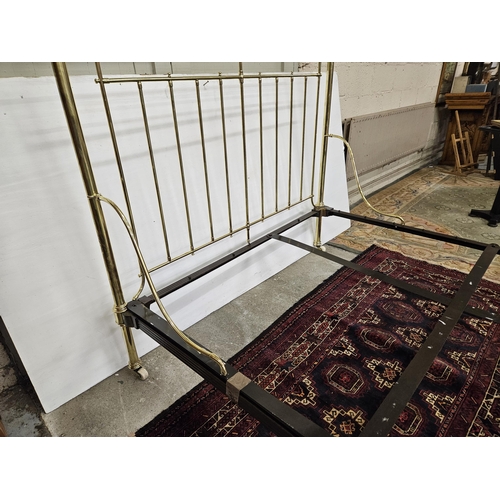 268 - Victorian Brass Bed Frame, 5 feet wide, with circular bar designs to the head and foot, in excellent... 