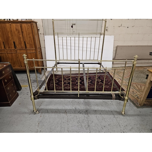 268 - Victorian Brass Bed Frame, 5 feet wide, with circular bar designs to the head and foot, in excellent... 