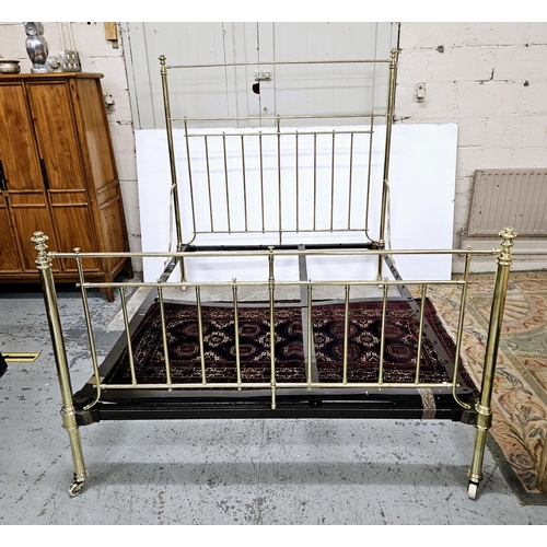 268 - Victorian Brass Bed Frame, 5 feet wide, with circular bar designs to the head and foot, in excellent... 