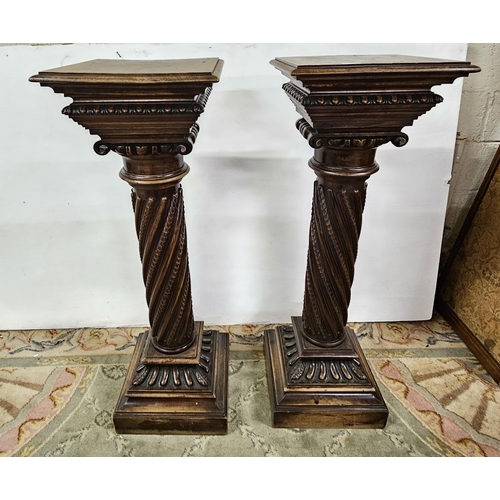 284 - Matching Pair of 19thC carved walnut Pedestals, decoratively carved corinthian column bodies, on squ... 