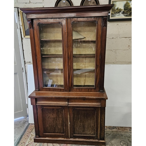 286 - 19thC Mahogany Bookcase - 2 glazed doors over 2 panelled doors and 2 drawers, on a platform base, 12... 