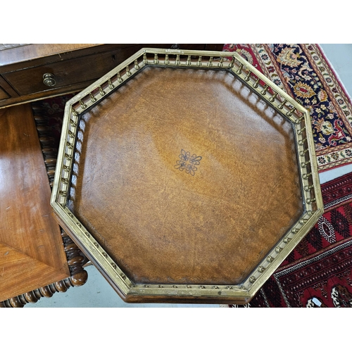 30 - Tooled brown leather topped Occasional / Lamp Table, with a raised brass gallery to the octagonal sh... 