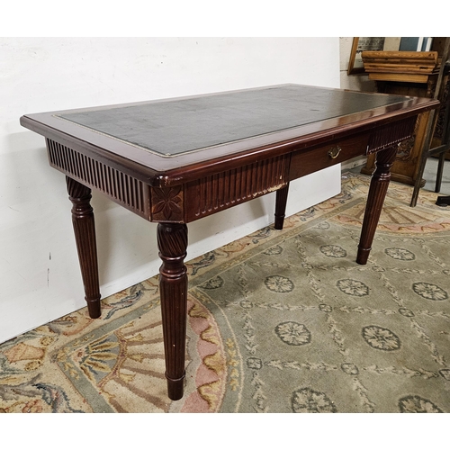 37 - Reproduction mahogany colour Writing Table with a tooled border green leatherette top, an apron draw... 