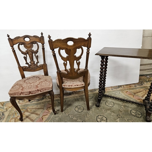 6 - Pair of continental Oak Salon Chairs, with decoratively carved splat backs and pink satin fabric cov... 