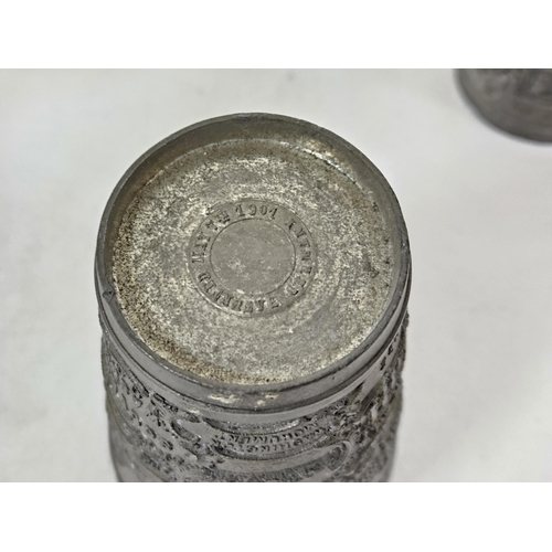 84 - Pair of low pewter cups 