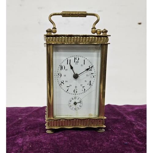 171 - Finely decorated Brass Cased small Carriage Clock, with striking bell, a white dial with month hand,... 