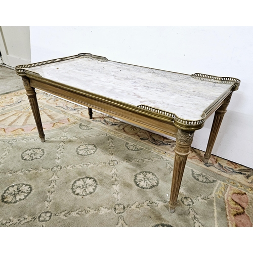 324 - Fine Quality French Marble Topped Coffee Table, on a limed oak base, a shaped and pierced brass gall... 