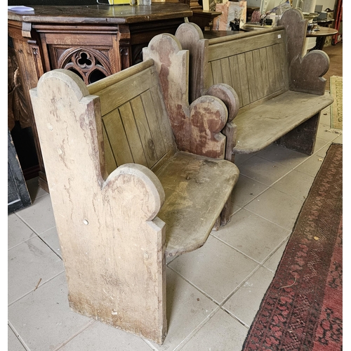 423 - Two Welsh Pitch Pine and Oak Church Pews with panelled backs and carved side arms, (1 x 1.13W & 1mH)... 