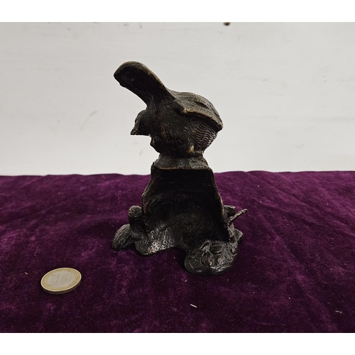 466 - Bronze Model of a Perched Bird, on a naturalistic base, 13cmH