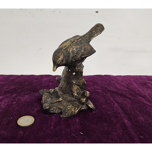 466 - Bronze Model of a Perched Bird, on a naturalistic base, 13cmH