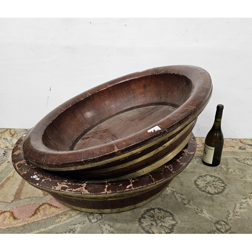 490 - Pair of large wooden oriental pans, brass banded (wear on rims), each 77cm dia