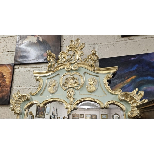 145 - Tall French Pier Mirror, in a carved wood frame, part painted green, with fino gold highlights, the ... 