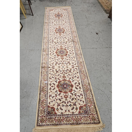 242 - Gold ground floor runner, lozenge medallion design. 3.05m x 0.7m