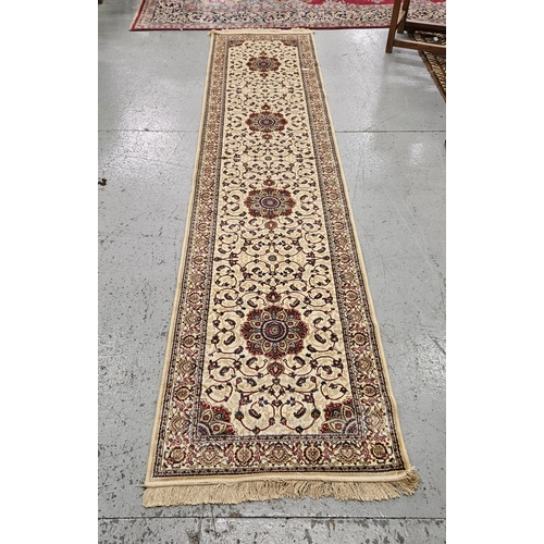 242 - Gold ground floor runner, lozenge medallion design. 3.05m x 0.7m