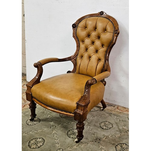 1 - Victorian Walnut Framed Armchair, the cameo shaped and buttoned back and seat upholstered with tan l... 
