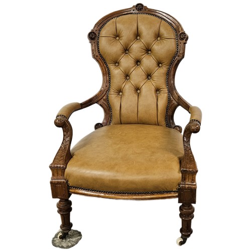 1 - Victorian Walnut Framed Armchair, the cameo shaped and buttoned back and seat upholstered with tan l... 