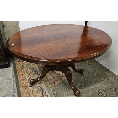 55 - Oval Topped Mahogany Dining Table on a pod with 4 cabriole legs, 1.3mW x 1.1W, polished condition.