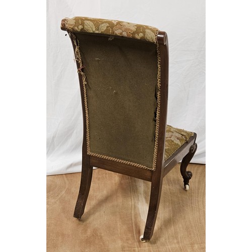 15 - Victorian Mahogany Nursing Chair, worn needlework tall back and seat, porcelain castors, 91cmH