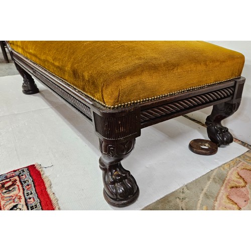 21 - Regency mahogany Chaise Longue, in the classical taste with a scrolled headrest, raised on carved pa... 