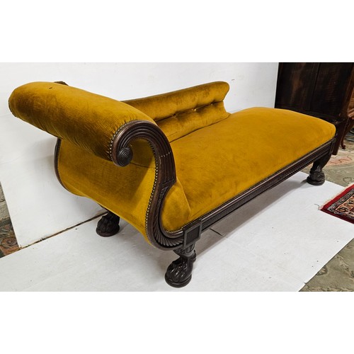 21 - Regency mahogany Chaise Longue, in the classical taste with a scrolled headrest, raised on carved pa... 