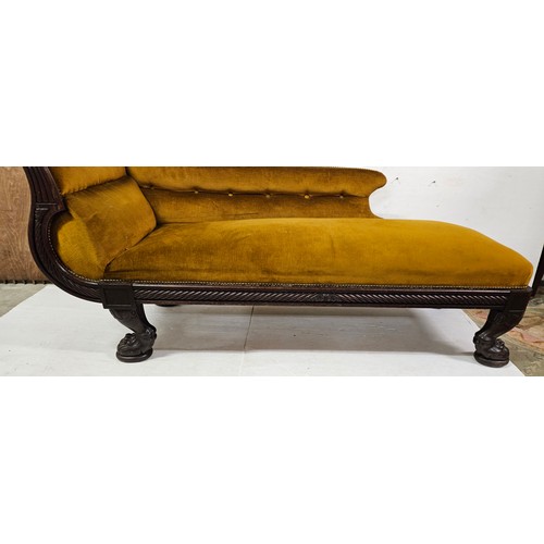 21 - Regency mahogany Chaise Longue, in the classical taste with a scrolled headrest, raised on carved pa... 