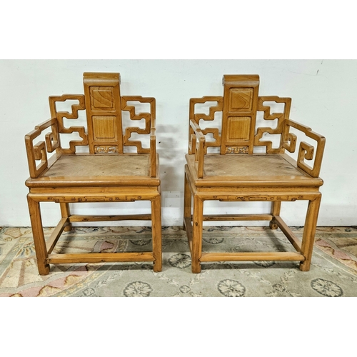 36 - Pair of Chinese Elm Throne Armchairs, with carved backs, scrolled arms and woven seats, 58cmh x 90cm... 