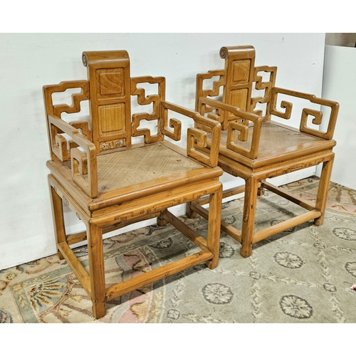 36 - Pair of Chinese Elm Throne Armchairs, with carved backs, scrolled arms and woven seats, 58cmh x 90cm... 