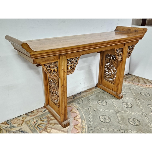 37 - Chinese Elm Alter Table, with curved ends and featuring dragon design carvings, 1.64cmW x 94cmH x 47... 