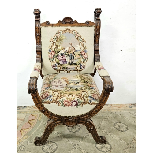 14 - French Throne Armchair, with carved lion head finials, the stuffed seat and back covered in needlepo... 