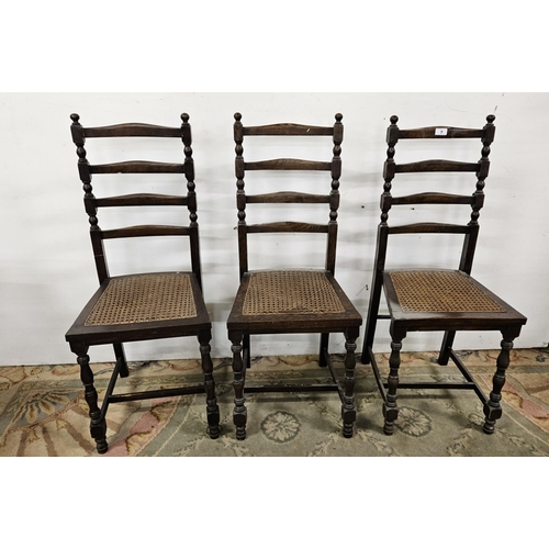 7 - Set of 3 ladder back French walnut Side Chairs, the wooden seats overlaid with cane, 94cmH