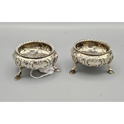 5 - Matching Pair of English Silver Condiment Dishes, with heraldic crest, floral chased bodies, each 7c... 