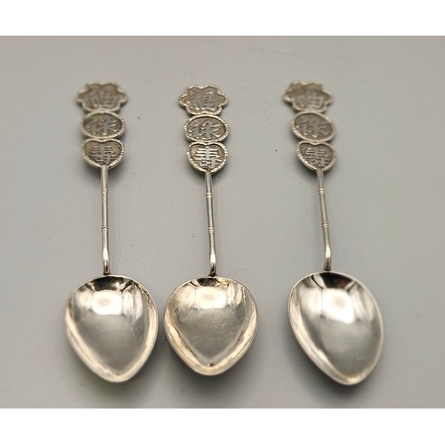 18 - Set of 3 Oriental Sterling Silver Coffee Spoons with sculpted handles (3