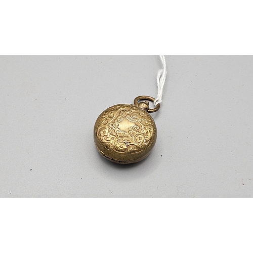 31 - Sovereign Holder Locket, with a chased body
