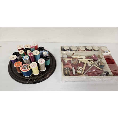 55 - A small box of exceptional sewing tools, thimbles etc., with 6 special decorative covers for the spo... 