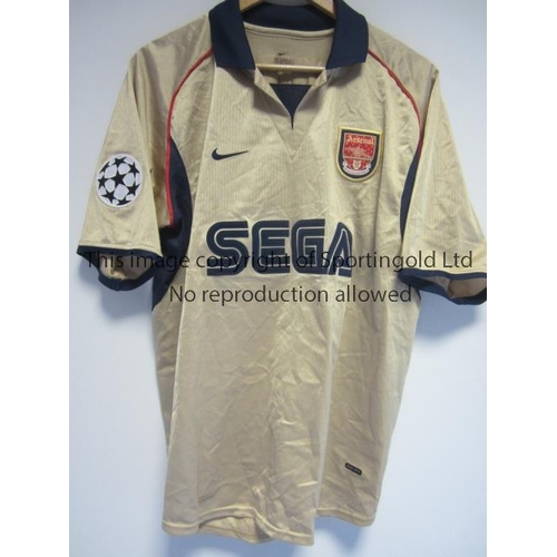 1490 - ARSENAL     A Nike gold with short sleeves away shirt 2001 - 2002 with Sega shirt sponsor and one Ch... 