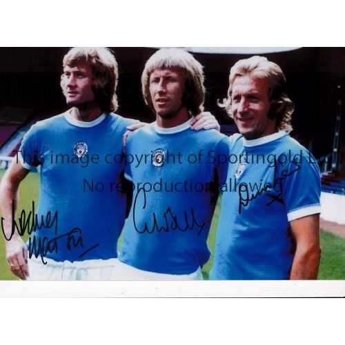 475 - MANCHESTER CITY      Autographed 12 x 8 col photo of Rodney Marsh, Colin Bell and Denis Law posing f... 