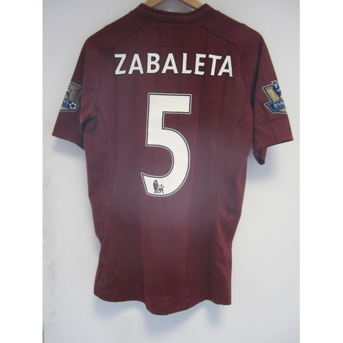 182 - MANCHESTER CITY MATCH WORN SHIRT / PABLO ZABALETA       Maroon, unwashed short sleeve shirt with The... 