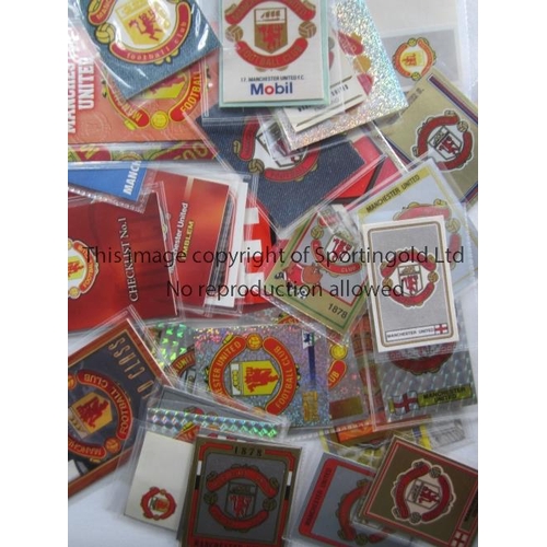 1028 - MANCHESTER UNITED   Forty three stickers, trade cards and phone cards with United club crests. Inclu... 