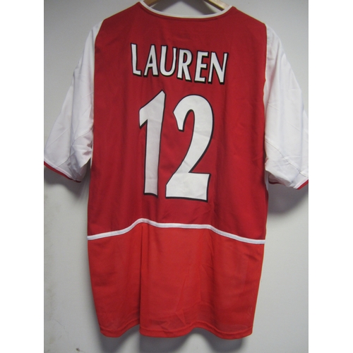 167 - LAUREN / MATCH WORN ARSENAL SHIRT        Red with white short sleeves shirt for the 2002 Community S... 