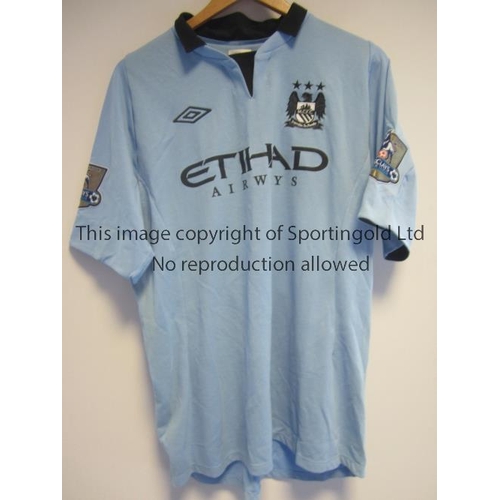 1181 - KOLO TOURE MANCHESTER CITY SHIRT        Kolo Toure number 42 short sleeve sky blue shirt from season... 