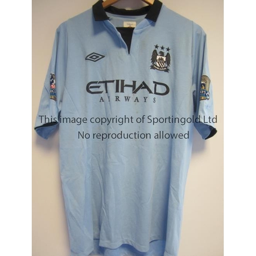 1182 - VINCENT KOMPANY MANCHESTER CITY SHIRT        Vincent Kompany number 4 short sleeve sky blue shirt fr... 