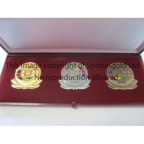 821 - 1985 WORLD GAMES MEDALS        A boxed set of 3 medals to look like gold, silver and bronze to comme... 