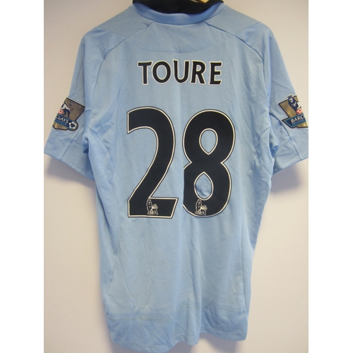 1181 - KOLO TOURE MANCHESTER CITY SHIRT        Kolo Toure number 42 short sleeve sky blue shirt from season... 