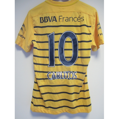 1183 - BOCA JUNIORS SHIRT       A medium size yellow with black hoops  short sleeve shirt with embroidered ... 