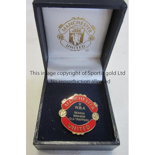 1596 - MANCHESTER UNITED   Badge in a presentation box for the home match against West Brom in 2004/5.   Go... 