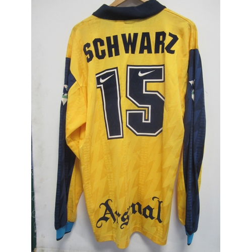 272 - ARSENAL PLAYER ISSUE SHIRT / STEFAN SCHWARZ     Scarce yellow shirt with blue and yellow long sleeve... 