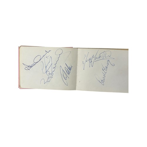 697 - LEEDS UNITED AUTOGRAPH BOOK, MULTI-SIGNED, DON REVIE/ CHERRY/ MADELEY/ GRAY X2/ CHARLTON/ COOPER/ HU... 