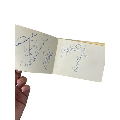 697 - LEEDS UNITED AUTOGRAPH BOOK, MULTI-SIGNED, DON REVIE/ CHERRY/ MADELEY/ GRAY X2/ CHARLTON/ COOPER/ HU... 
