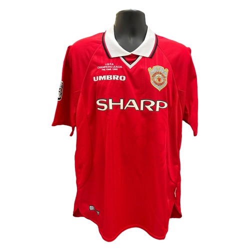 OLE GUNNAR SOLSKJAER MANCHESTER UNITED 1999 CHAMPIONS LEAGUE FINAL MATCH ISSUED FOOTBALL SHIRT, SHORT SLEEVED SHIRT ISSUED TO SOLSKJAER WHO WORE LONG SLEEVES THAT NIGHT, CHAMPIONS LEAGUE PATCH TO SLEEVE, CHAMPIONS LEAGUE FINAL 1999 EMBROIDERY, AN INCREDIBLE PIECE ISSUED TO SOLSKJAER WHO SCORED THE WINNING GOAL THAT NIGHT TO COMPLETE THE TREBLE. SHIRT WAS PURCHASED FROM THE RAY ADLER COLLECTION.